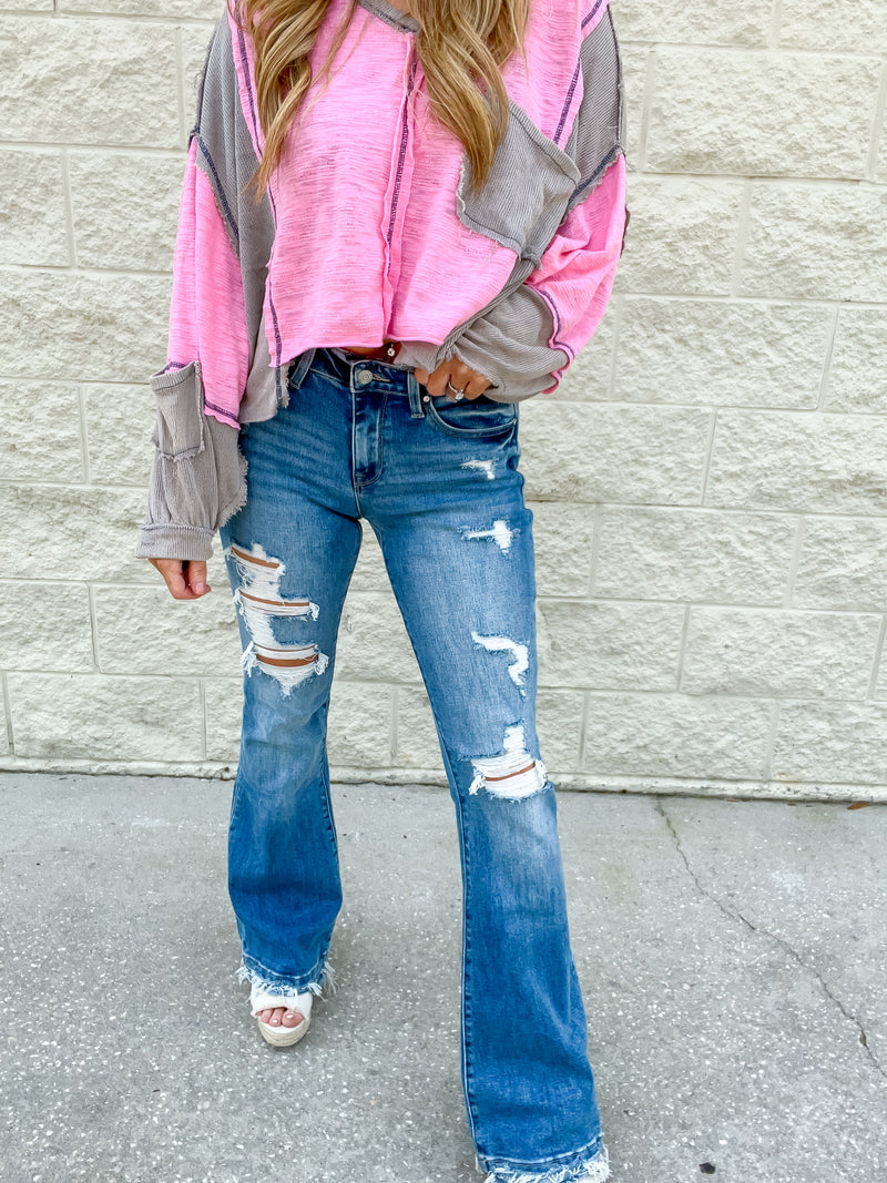 Kyra Mid Rise Distressed Flare Jeans
