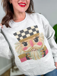 Faux Yarn Nutcracker Graphic Top