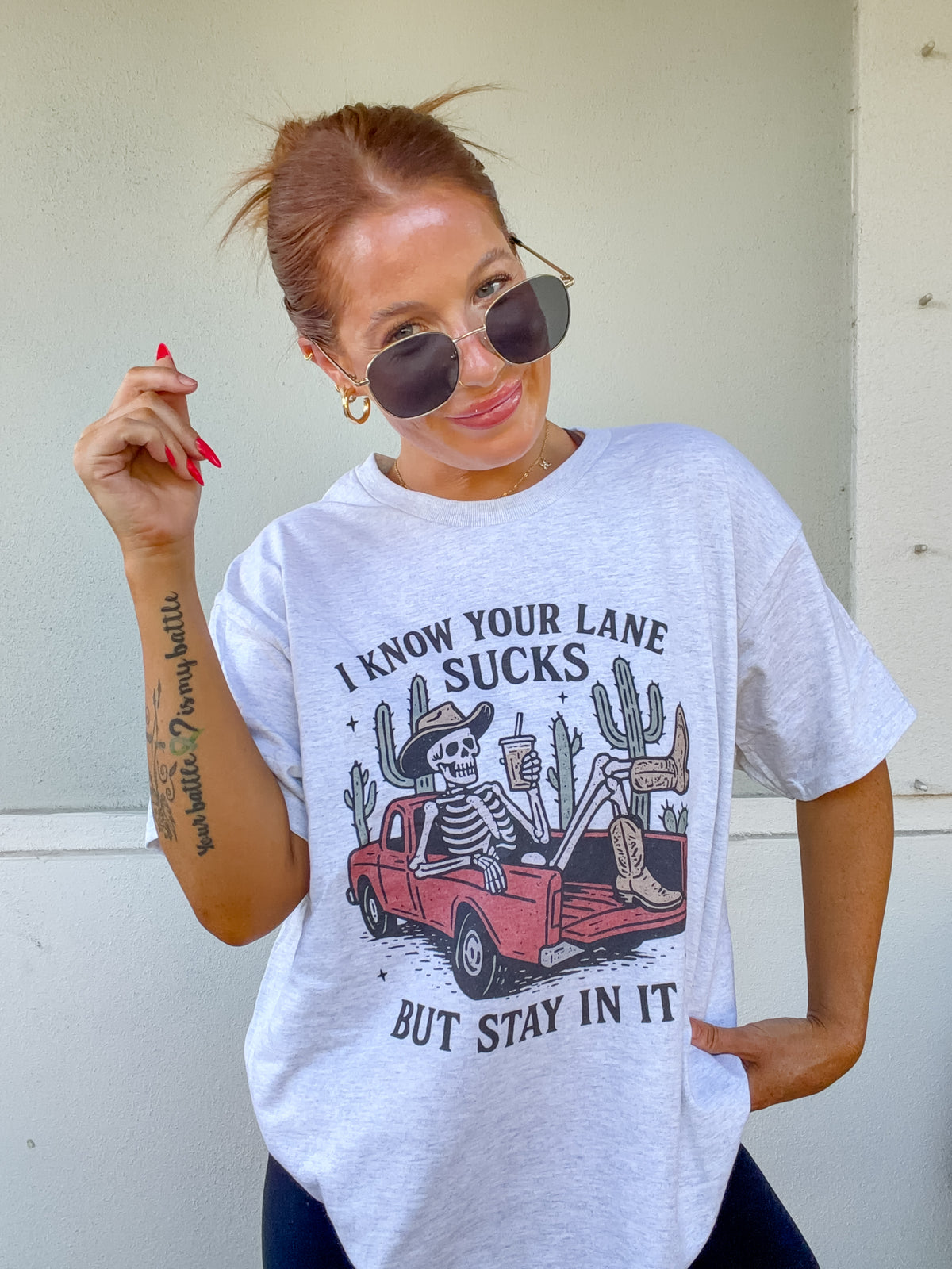Skeleton Lane Sucks Graphic Top