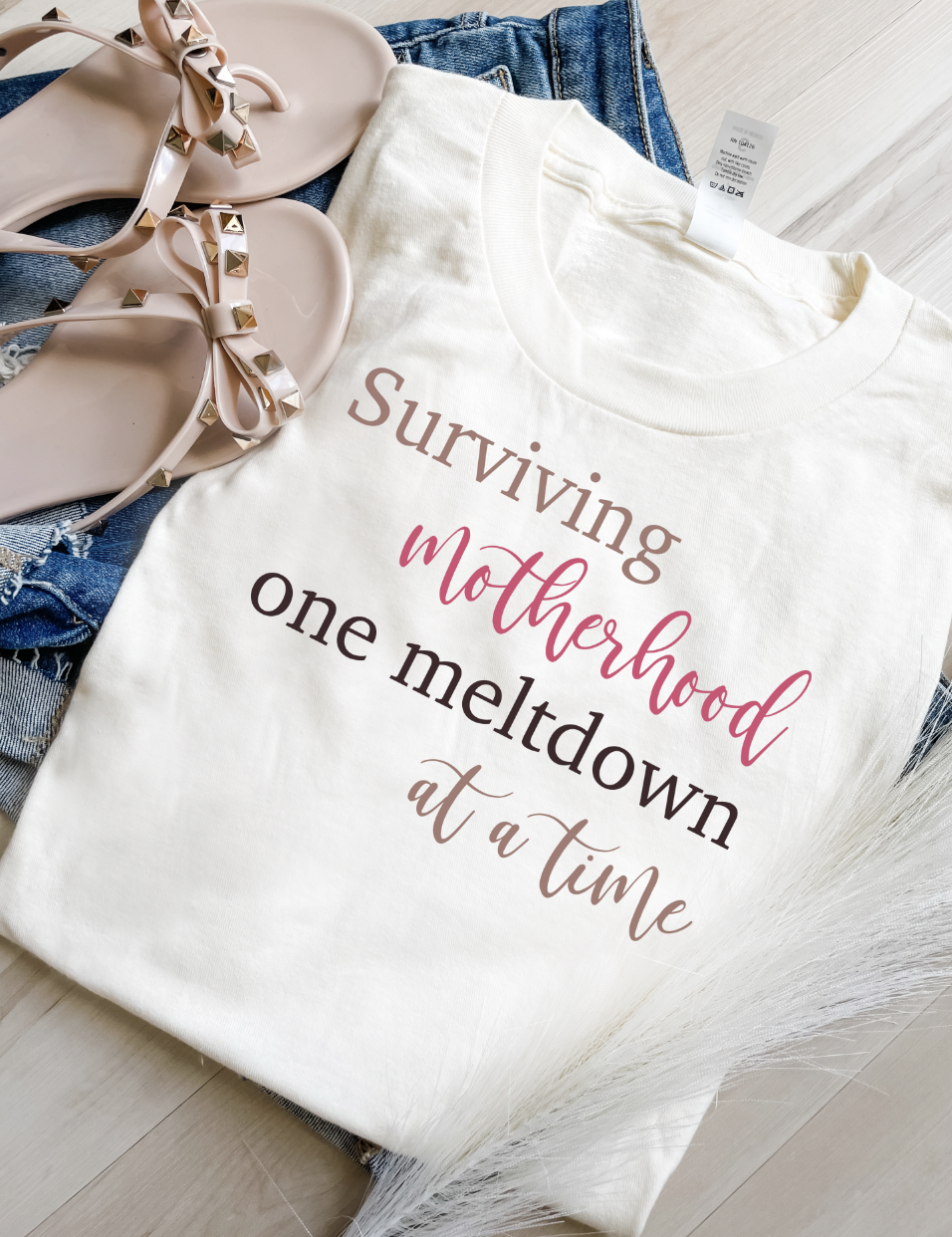 Surviving Motherhood Graphic Tee